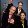 Publicity photo of Jay Leonhart Quartet; musicians (Front L-R) Jay Leonhart & David Samuels, (Top L-R) Jim Pugh & Terry Clarke (New York)