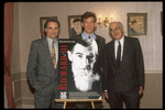 Actor Ian McKellan (C), standing behind poster of production of "Richard III" with Harvey Lichtenstein (R), head of the Brooklyn Academy of Music (BAM) (New York)