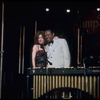 Singer/actress Bette Midler and musician Lionel Hampton in scene from Broadway concert "Clams on the Half Shell" (New York)