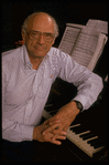 Publicity photo of playwright Arthur Miller at piano during rehearsal for his show "Up from Paradise" (New York)