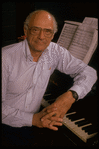 Publicity photo of playwright Arthur Miller at piano during rehearsal for his show "Up from Paradise" (New York)