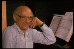 Publicity photo of playwright Arthur Miller at piano during rehearsal for his show "Up from Paradise" (New York)