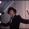 Producer Joseph Papp singing at nightclub appearance at The Ballroom (New York)