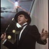 Producer Joseph Papp singing at nightclub appearance at The Ballroom (New York)