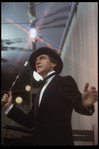 Producer Joseph Papp singing at nightclub appearance at The Ballroom (New York)