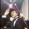 Producer Joseph Papp singing at nightclub appearance at The Ballroom (New York)