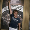 Producer Joseph Papp posing in front of Shubert Theatre with top hat from "A Chorus Line" on occasion of it becoming the longest running Broadway musical (New York)