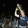 Producer Joseph Papp posing with top hats from "A Chorus Line" on occasion of it becoming the longest running Broadway musical (New York)