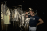 Producer Joseph Papp posing with top hat & costumes from "A Chorus Line" on occasion of it becoming the longest running Broadway musical (New York)