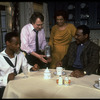 Producer Joseph Papp (2L) with actress Gloria Foster (2R) and cast during rehearsal of play "Forbidden City" at the New York Shakespeare Festival Theater (New York)