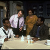 Producer Joseph Papp (2L) with actress Gloria Foster (2R) and cast during rehearsal of play "Forbidden City" at the New York Shakespeare Festival Theater (New York)