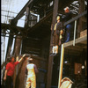 Director Harold Prince (R) overseeing construction of set for Broadway musical "Sweeney Todd" at the Peter Feller studios (New York)