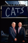 Producers (L-R) Bernard Jacobs & Gerald Schoenfeld under marquee of Winter Garden Theater, housing their production of musical "Cats" (New York)