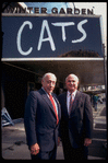 Producers (L-R) Bernard Jacobs & Gerald Schoenfeld under marquee of Winter Garden Theater, housing their production of musical "Cats" (New York)