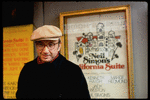 Playwright Neil Simon in front of theater where his play "California Suite" is playing (New York)