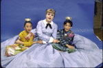 Actors Angela Lansbury, Julie Woo and Gene Profanato in a publicity shot for the replacement cast of the Broadway revival of the musical "The King and I" (New York)