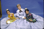 Actors Angela Lansbury, Julie Woo and Gene Profanato in a publicity shot for the replacement cast of the Broadway revival of the musical "The King and I" (New York)