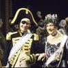 Actor (fr., R) Dennis King, in cross-dressing, w. cast members in a scene fr. the Broadway play "A Patriot For Me." (New York)