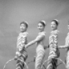 Zina Bethune at the right, Teena McConnell as Candy Canes (Hoops) third from left in a New York City Ballet production of "The Nutcracker."