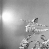 Deni Lamont and three students from the School of American Ballet as Candy Canes (Hoops), in a New York City Ballet production of "The Nutcracker."