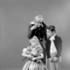 Judith Fugate as Clara, John-Pierre Frohlich as the nephew and  Shaun O'Brien as Drosselmeyer, in a New York City Ballet production of "The Nutcracker."