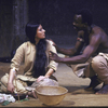 Actors (L-R) Mallika Sarabhai and Mamadou Dioume in a scene from the Paris production of the play cycle "The Mahabharata." (Paris)