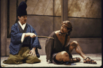 Actors (L-R) Allan Tung and James Saito in a scene from the Roundabout Theatre's production of the play "Rashomon." (New York)