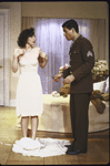 Actors (L-R) J. Smith-Cameron and Chris Sarandon in a scene from the Roundabout Theatre's production of the play "The Voice of the Turtle." (New York)