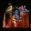 Actors Bernadette Peters (L) and Martin Short sitting in and on top of kitchen set in scene from Broadway production of Neil Simon adaptation of his movie "The Goodbye Girl"