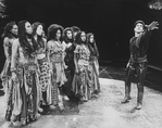 A man addressing a group of women in a scene from the Circle In The Square production of the play "The Bacchae"