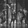 Actress Danitra Vance singing and dancing with two unidentified men in a performance of the Public Theater's production of "Spunk," three short plays based on the works of Zora Neale Hurston.
