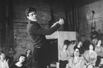 Actor Raul Julia conducting an orchestra of the women in his life incl. Karen Akers (2L) during a rehearsal for the Broadway production of the musical "Nine.".