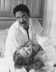 Actors Raul Julia as Othello and Kathryn Meisle as Desdemona in the NY Shakespeare Festival Central Park production of the play "Othello.".