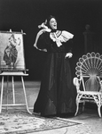 Actor Raul Julia wearing a dress in a scene from the Circle in the Square production of the musical "Where's Charley?"