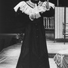 Actor Raul Julia wearing a dress in a scene from the Circle in the Square production of the musical "Where's Charley?"
