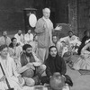 Director Peter Brook (C) with the cast on the set of his production of the Indian legend "The Mahabharata" which was performed at BAM.