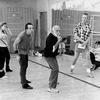 Choreographer Jerome Robbins showing dancer Michael Scott Gregory (2L) a move as asst. director Grover Dale (2R) looks on during a rehearsal of the Broadway production of the musical "Jerome Robbins' Broadway.".
