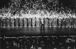 Director/choreographer Michael Bennett (C), flanked by dancers from all companies, greeting the invited audience at performance #3,389 of the Broadway production of the musical "A Chorus Line," making it the longest running show in Broadway history.