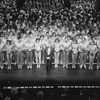 Director/choreographer Michael Bennett (C), flanked by dancers from all companies, greeting the invited audience at performance #3,389 of the Broadway production of the musical "A Chorus Line," making it the longest running show in Broadway history.