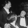 Director/choreographer Michael Bennett congratulating producer Gerald Schoenfeld (R) at a party following performance #3,389 of the Broadway production of the musical "A Chorus Line," making it the longest running show in Broadway history.