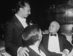 Director/choreographer Michael Bennett congratulating producer Gerald Schoenfeld (R) at a party following performance #3,389 of the Broadway production of the musical "A Chorus Line," making it the longest running show in Broadway history.