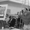 Director/choreographer Michael Bennett showing the show poster during a rehearsal of the Broadway musical "Dreamgirls.".