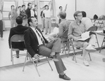Director/choreographer Michael Bennett (L) watching a rehearsal for gala performance #3,389 of the Broadway musical "A Chorus Line," making it Broadway's longest running show.