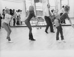 Director/choreographer Michael Bennett reviewing a dance during a rehearsal for gala performance #3,389 of the Broadway musical "A Chorus Line," making it Broadway's longest running show.