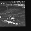 Director/playwright Arthur Laurents sitting at a table (C) with other staff people in the audience of the Marquis Theatre during a rehearsal for the Broadway production of the musical "Nick And Nora."