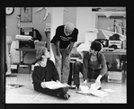 Director-choreographer Jerome Robbins (C) speaking with two dancers at a rehearsal of the Broadway production of the musical "Jerome Robbins' Broadway.".