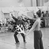 Director/choreographer Jerome Robbins showing dancers movement from the "Little House Of Uncle Tom" number from "The King And I" during a rehearsal of the Broadway production of the musical "Jerome Robbins' Broadway.".