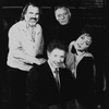 (L-R) Director Milton Katselas, producer Zev Bufman and actors Richard Burton and Elizabeth Taylor taking a break in rehearsing the Broadway revival of the play "Private Lives.".