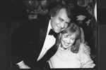 Producer Joseph Papp hugging actress Anne Meara at the opening night party for the NY Shakespeare Festival production of the play "Cafe Crown"