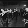 Director/choreographer Bob Fosse (R) watching with unidentified dancers during a rehearsal for the Broadway production of the musical "Dancin'.".